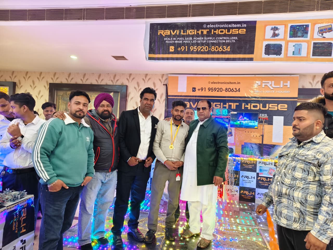 Ravi Light House receiving recognition at an industry event